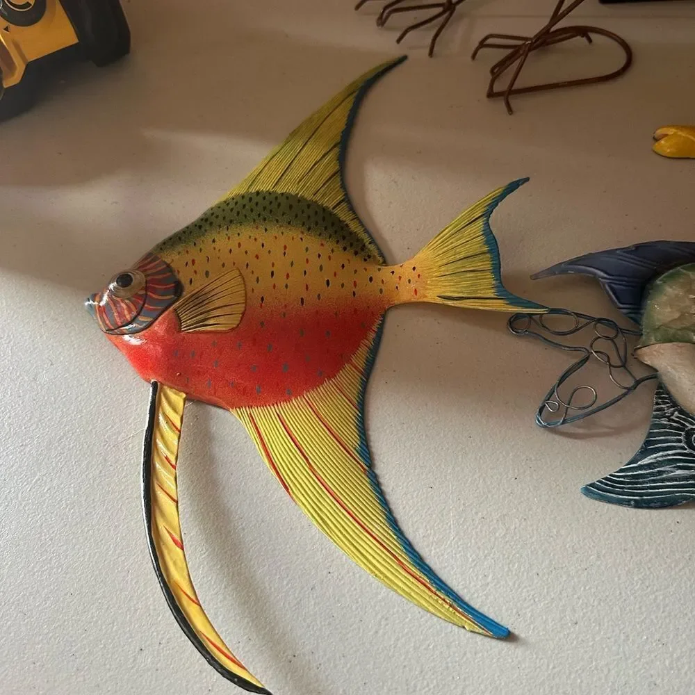 Red and Yellow Fish Decor with Artistic Design